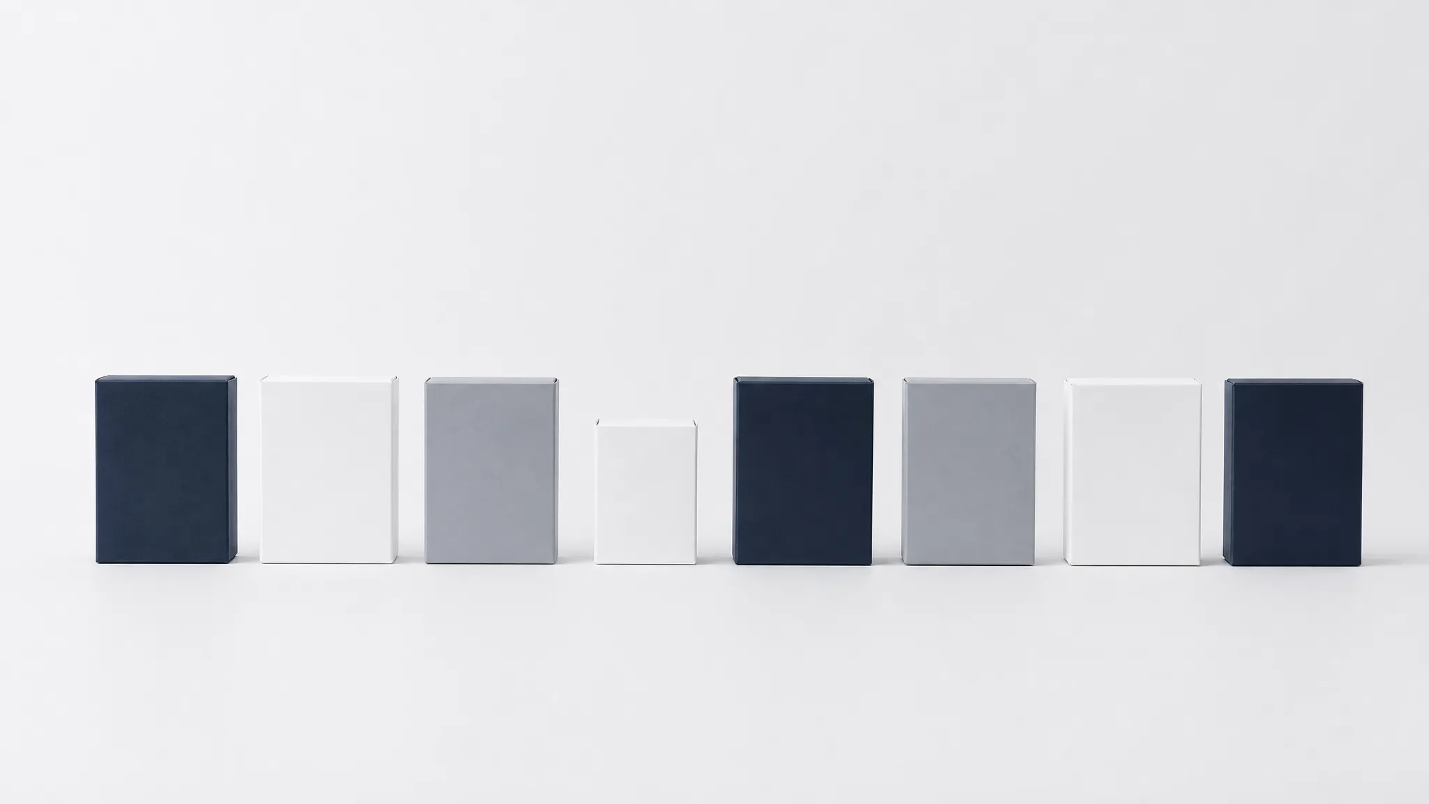 Row of similar-looking boxes with one subtly different, representing naming confusion between model versions